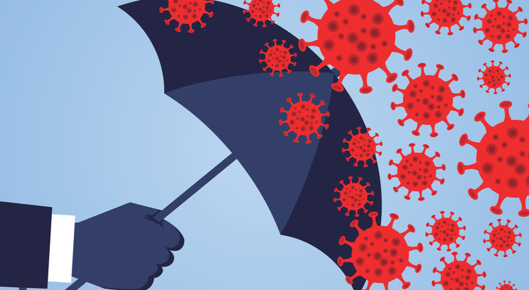 an umbrella blocking several virus cells