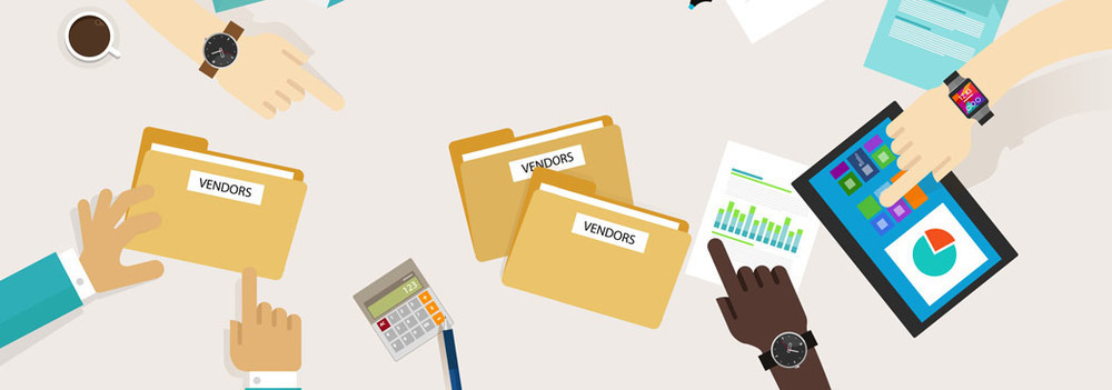 Several hands pointing at folders labeled Vendor and other objects on a table.