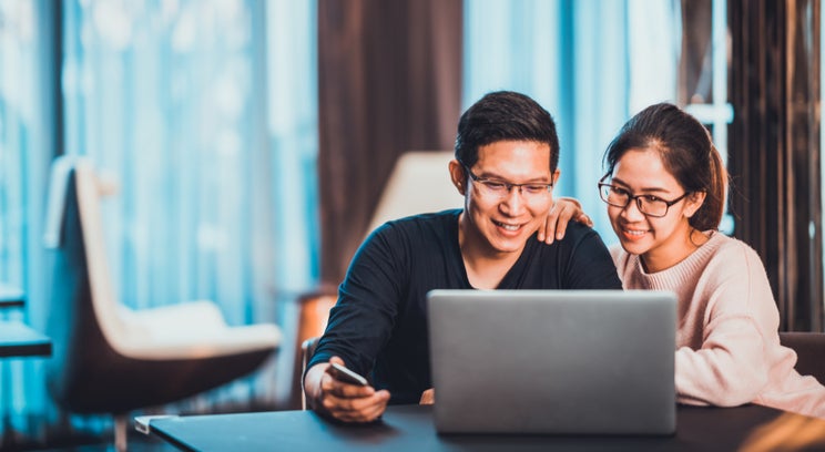 A married couple working from home