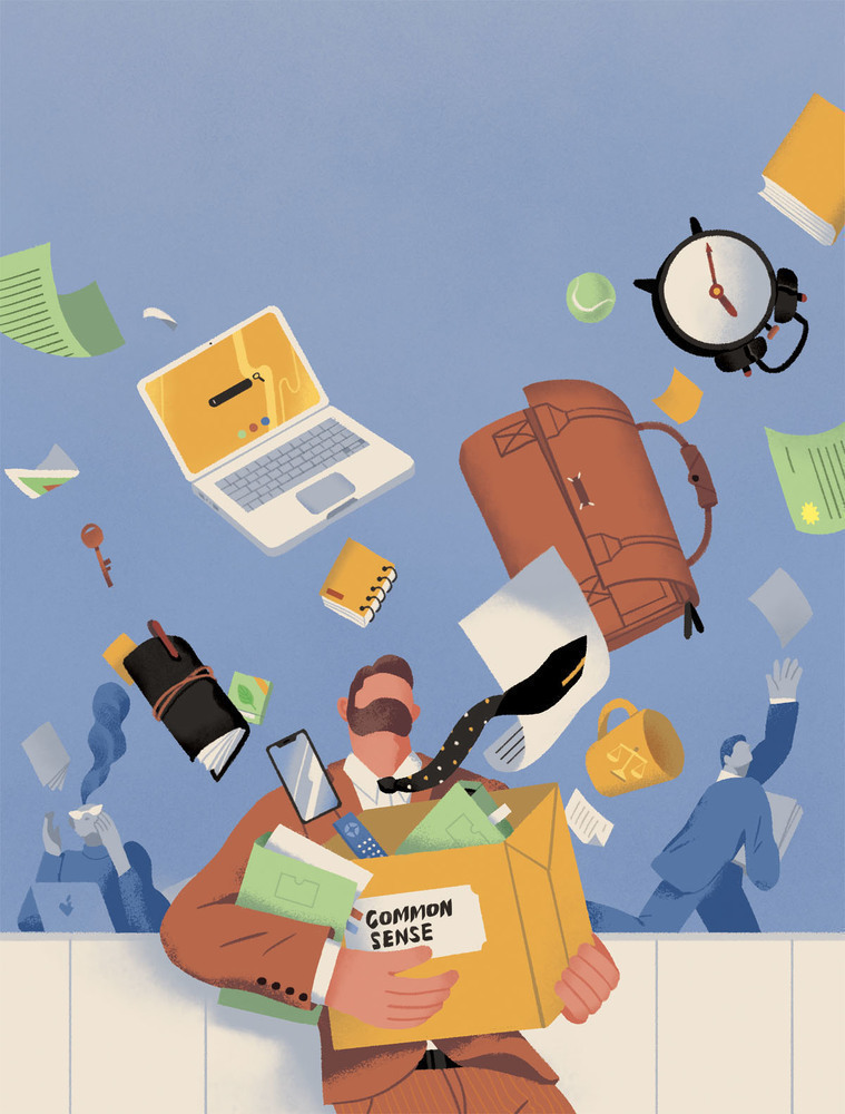 man holding a box labeled common sense. his belongings are flying out of the box