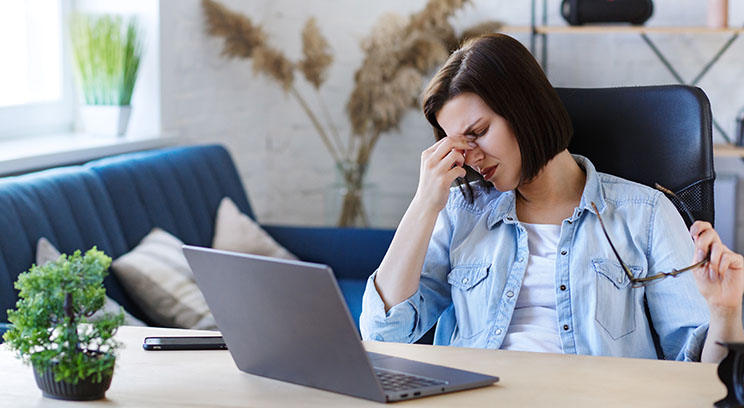 a stressed woman working from home