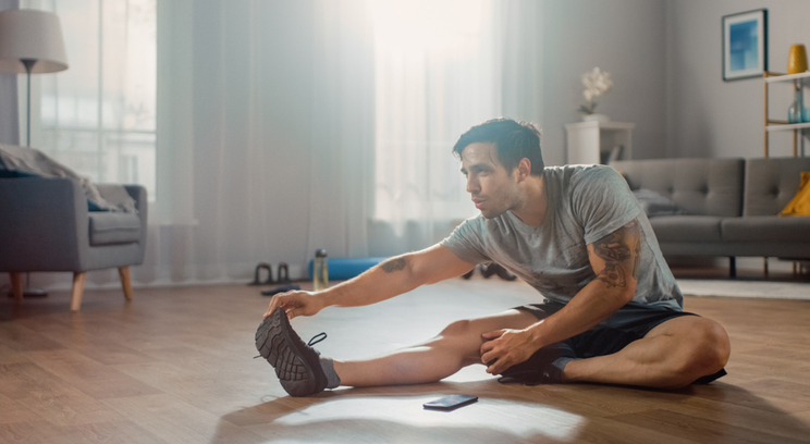 a man working out at home