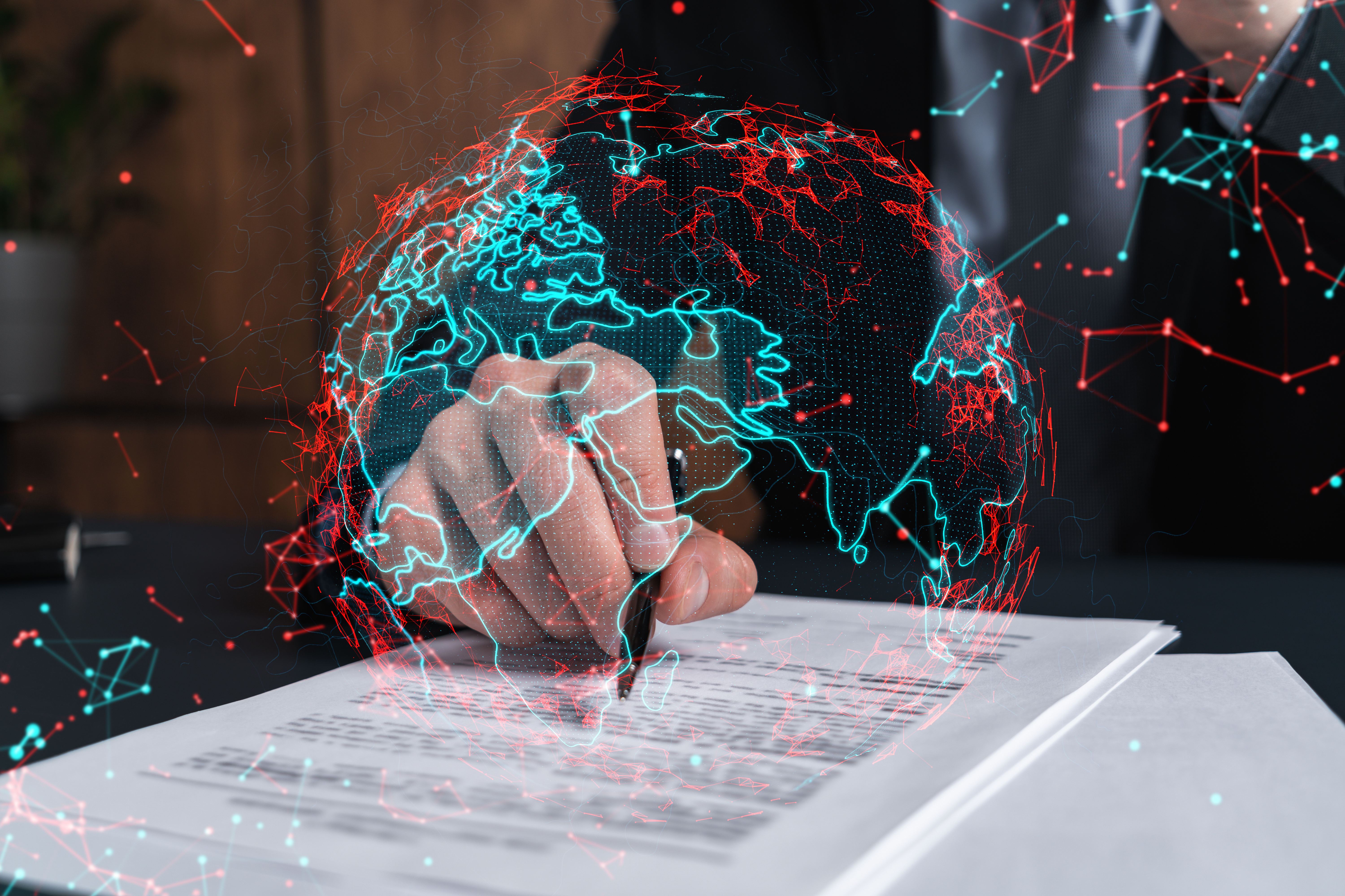 Businessman in suit signs contract. Double exposure with world map hologram. Man signing agreement international business concept.