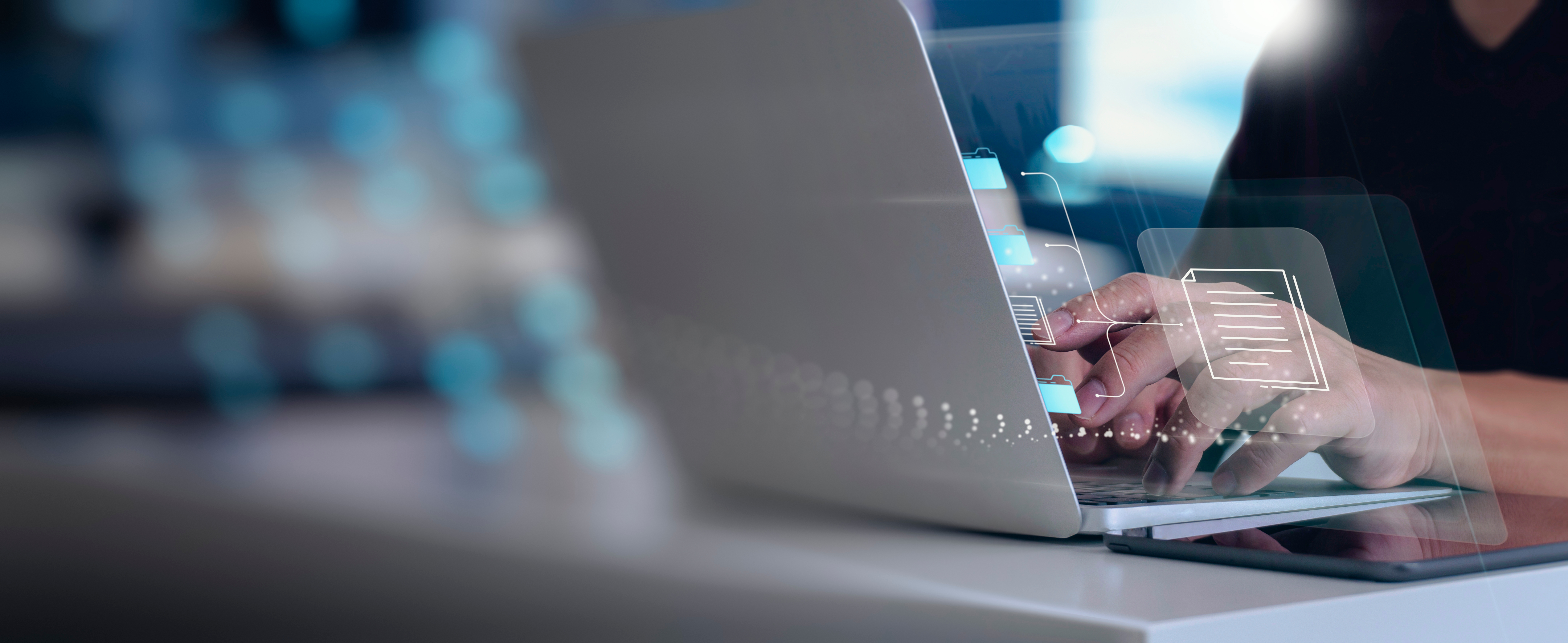 Man choosing file icon on laptop.