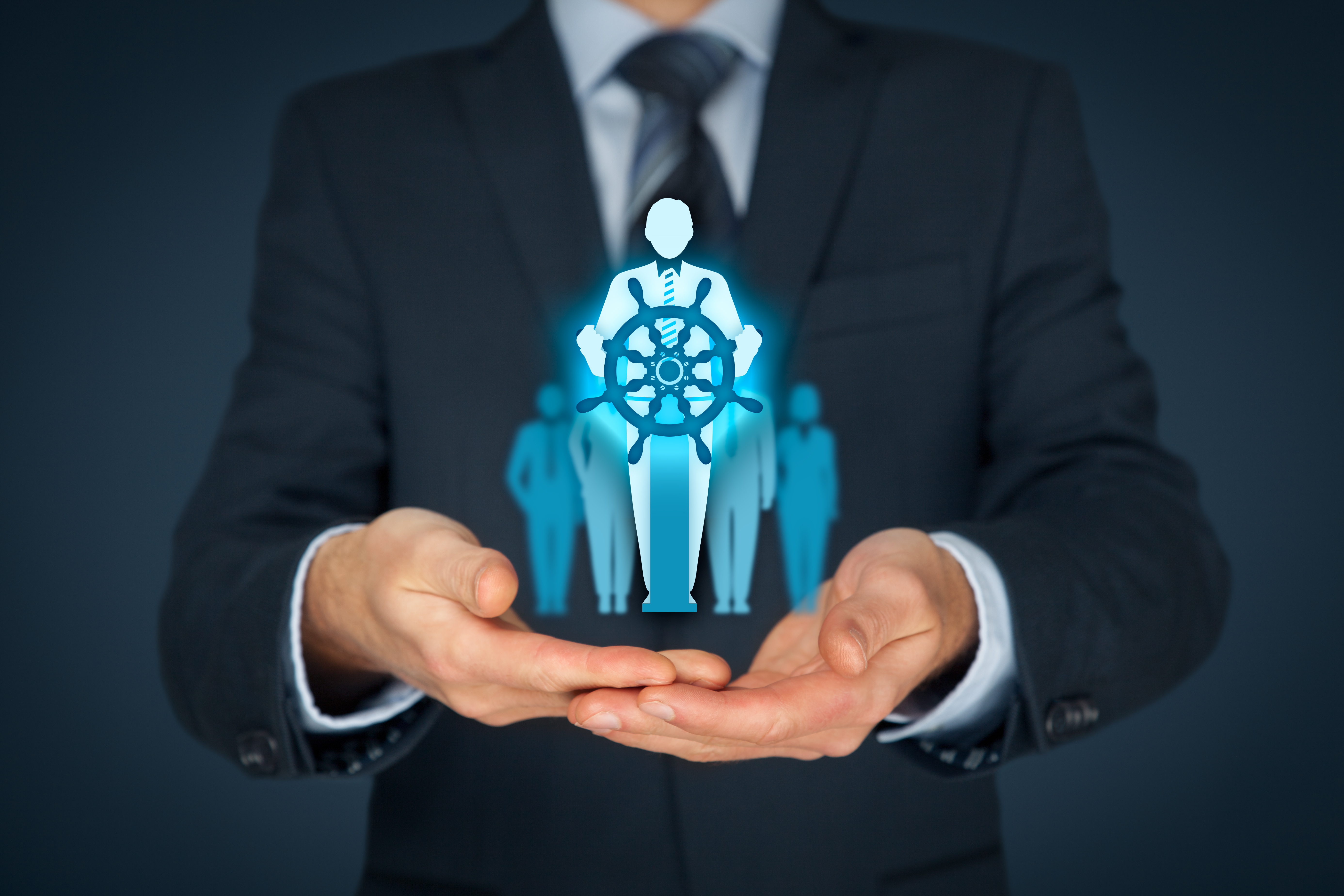 Captain steering ship to show leadership.