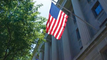 flag flying outside a building