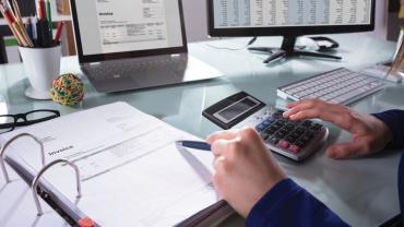 A person working on an invoice