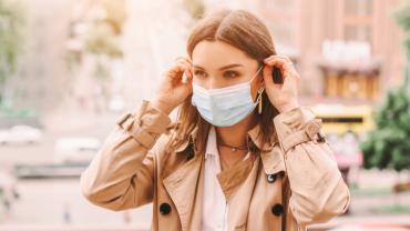 a woman wearing a mask