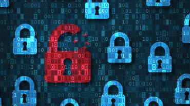 Broken red padlock and secure blue padlocks in front of a gray background made of code.