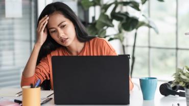 Stressed woman on video call