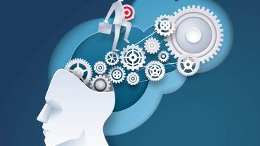 drawing of head, skull open with pouring out cogs, gears, and wheels, and pant-suited figure with briefcase walking up it with target sign