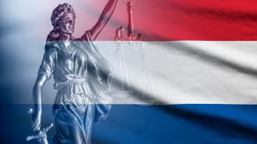 Lady Justice with Netherlands flag background