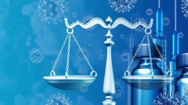 scales of justice with vial in background