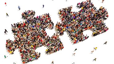 puzzple pieces that are about to fit into each other, filled with images of people