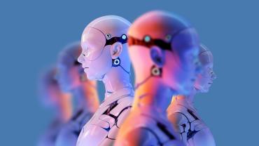 Group of humanoid robots lined up in a row. 