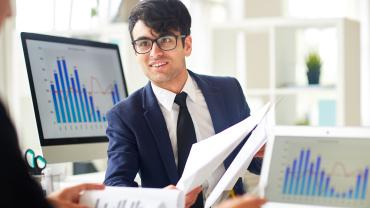 Worker with financial documents