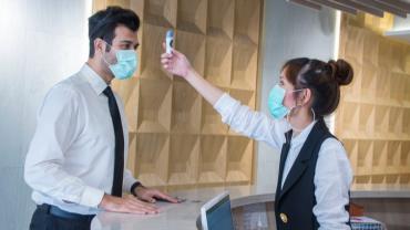 COVID temperature check in an office