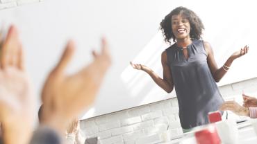 a business woman giving a presentation