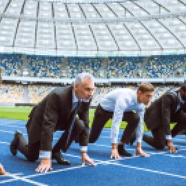 Businesspeople preparing to race