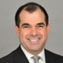 Headshot of Lonnie Giamela