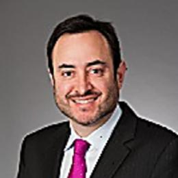 Headshot of Andrew Greenfield