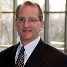 Headshot of Gregory R. Watchman