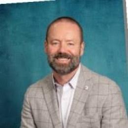 Headshot of Greg Scheutz