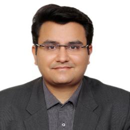 Headshot of Nitin Suri