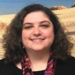 Headshot of Aline V. Drucker