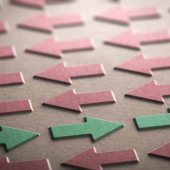 a few green arrows pointed right while many red arrows are pointed left