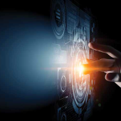 a finger touching a futuristic visual display