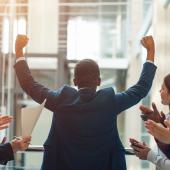 Colleagues celebrating team member