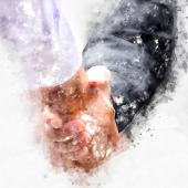 hands shaking with clothed arms showing, one hand white, the other light brown