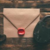 envelope with seal wax on, key on one side, lock on another -- to symbolize legal privilege